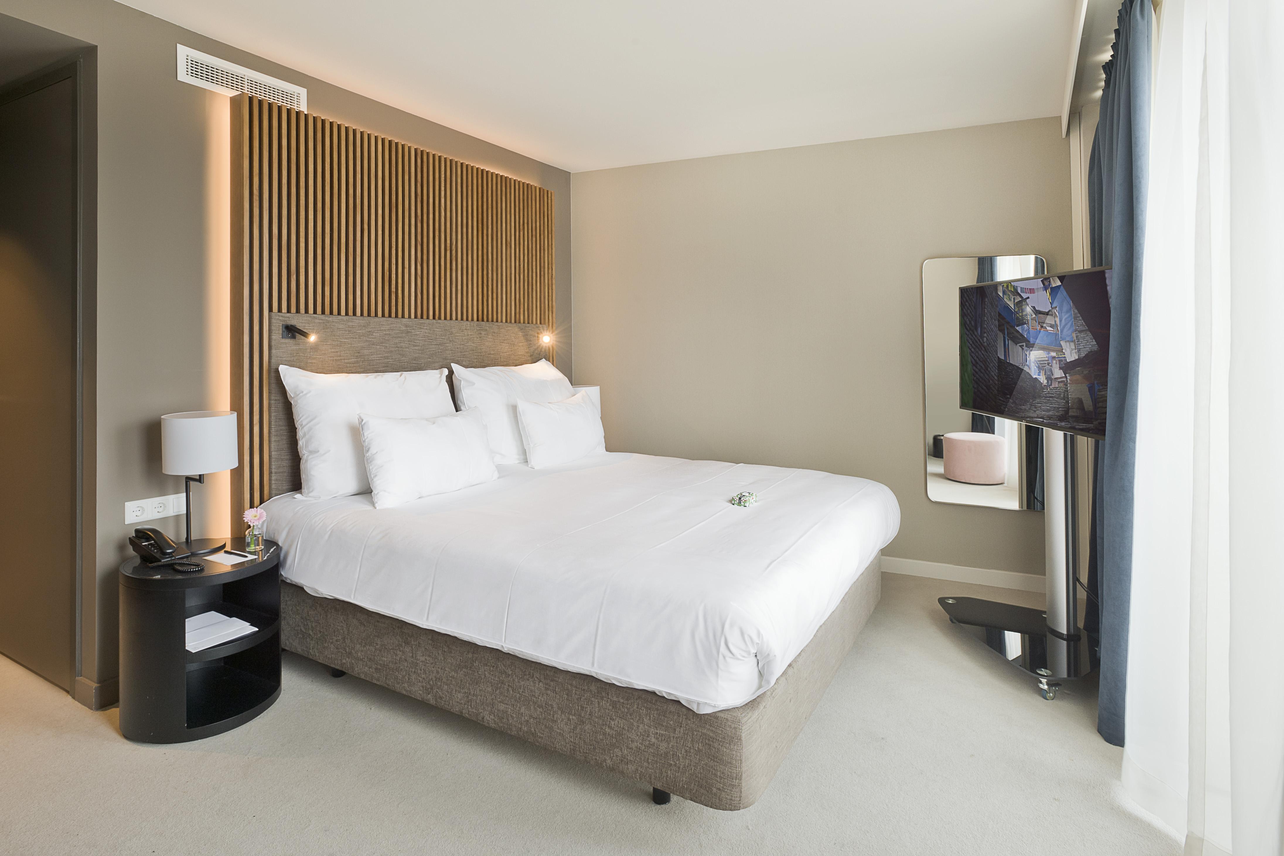 Pestana Amsterdam Riverside Exterior foto A bedroom at the hotel