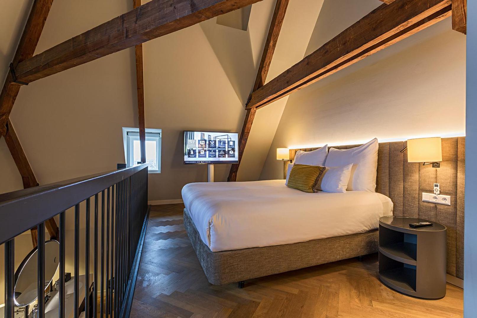 Pestana Amsterdam Riverside Exterior foto A bedroom at the hotel