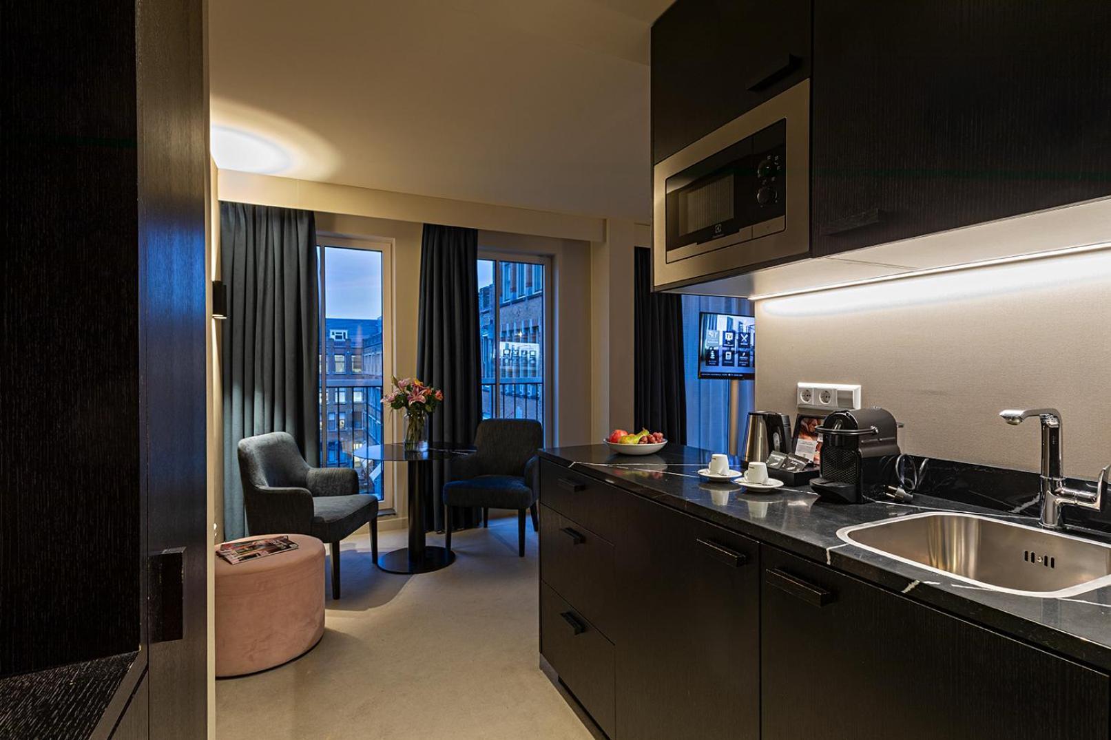 Pestana Amsterdam Riverside Exterior foto Kitchenette in a serviced apartment