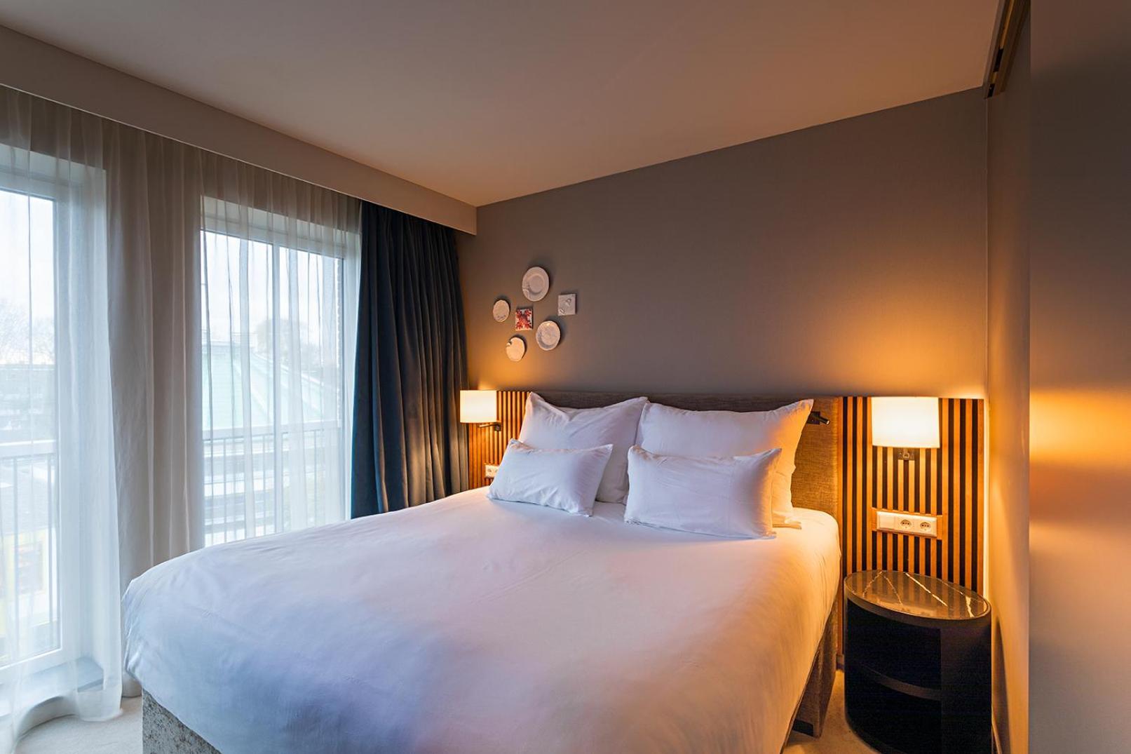 Pestana Amsterdam Riverside Exterior foto A bedroom at the hotel
